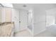 Updated bathroom with a walk-in shower and modern fixtures at 3021 Countryside Blvd # 28A, Clearwater, FL 33761