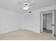 Spacious bedroom with ample closet space and access to the bathroom at 3021 Countryside Blvd # 28A, Clearwater, FL 33761