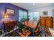 Bright dining room with a wooden table and colorful rug at 3021 Countryside Blvd # 28A, Clearwater, FL 33761