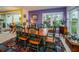 Bright dining area with wooden table and view of the golf course at 3021 Countryside Blvd # 28A, Clearwater, FL 33761