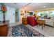 Bright condo entryway with view into living room at 3021 Countryside Blvd # 28A, Clearwater, FL 33761
