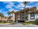 Condo building exterior showcasing multiple levels and balconies at 3021 Countryside Blvd # 28A, Clearwater, FL 33761