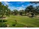 Expansive view of the well-manicured golf course at 3021 Countryside Blvd # 28A, Clearwater, FL 33761