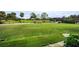 Panoramic view of a beautiful golf course and clubhouse at 3021 Countryside Blvd # 28A, Clearwater, FL 33761