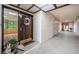 Building hallway with access to condo unit at 3021 Countryside Blvd # 28A, Clearwater, FL 33761