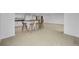 Kitchen with island and white cabinets at 3021 Countryside Blvd # 28A, Clearwater, FL 33761