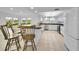 Modern kitchen with stainless steel appliances and a large island with seating at 3021 Countryside Blvd # 28A, Clearwater, FL 33761