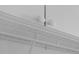 White kitchen cabinets with wire shelving at 3021 Countryside Blvd # 28A, Clearwater, FL 33761