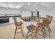 Bright kitchen featuring white cabinets, granite counters, and stainless steel appliances at 3021 Countryside Blvd # 28A, Clearwater, FL 33761