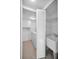 Laundry room with washer, dryer, cabinets, and utility sink at 3021 Countryside Blvd # 28A, Clearwater, FL 33761