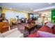 Spacious living room with ample seating and large windows at 3021 Countryside Blvd # 28A, Clearwater, FL 33761