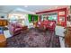 Open living room showcasing colorful decor and area rug at 3021 Countryside Blvd # 28A, Clearwater, FL 33761