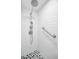 Clean shower with white subway tile and a modern showerhead at 3021 Countryside Blvd # 28A, Clearwater, FL 33761