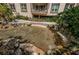 Relaxing water feature with stonework and tropical plants at 3021 Countryside Blvd # 28A, Clearwater, FL 33761