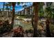 Tropical landscaping and water features in a condo community at 3021 Countryside Blvd # 28A, Clearwater, FL 33761