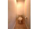 Small bathroom with toilet and tile floor at 31207 Chatterly Dr, Wesley Chapel, FL 33543