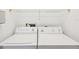 Close up of a white washer and dryer set at 3332 Mcmath Dr, Palm Harbor, FL 34684