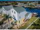 Aerial view of waterfront home with private dock and boat at 5305 Boardwalk St, Holiday, FL 34690