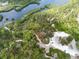 Aerial view of community with nature trails and waterways at 2711 Coldstone Ln, Holiday, FL 34691