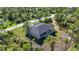 New home with backyard and spacious lot, surrounded by lush greenery at 9333 Hialeah Ter, Port Charlotte, FL 33981