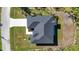 Overhead view of house, driveway, and yard at 9333 Hialeah Ter, Port Charlotte, FL 33981