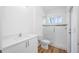 Well-appointed bathroom with shower, toilet and vanity at 9333 Hialeah Ter, Port Charlotte, FL 33981