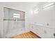 Modern bathroom with double vanity and glass shower at 9333 Hialeah Ter, Port Charlotte, FL 33981