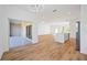 Open dining area with hardwood floors and access to the backyard at 9333 Hialeah Ter, Port Charlotte, FL 33981