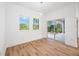 Bright dining room with sliding glass doors leading to the backyard at 9333 Hialeah Ter, Port Charlotte, FL 33981