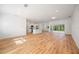Spacious living room with hardwood floors and lots of natural light at 9333 Hialeah Ter, Port Charlotte, FL 33981