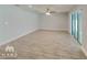 Bright and airy living room with tile flooring and ceiling fan at 12731 N Ola Ave, Tampa, FL 33612