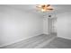 Bright bedroom with gray carpet and ceiling fan at 2333 Feather Sound Dr # A203, Clearwater, FL 33762