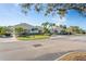 Exterior view of community clubhouse with landscaping at 2333 Feather Sound Dr # A203, Clearwater, FL 33762