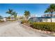 Community entrance with landscaping and signage at 2333 Feather Sound Dr # A203, Clearwater, FL 33762