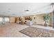 Lobby with seating area and patterned rug at 2333 Feather Sound Dr # A203, Clearwater, FL 33762