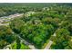 Aerial view of a wooded lot at 1026 Roosevelt Ave, Spring Hill, FL 34604