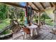 Relaxing patio area with seating and pond view at 1026 Roosevelt Ave, Spring Hill, FL 34604
