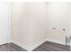 Laundry room with hookups and neutral colored walls at 8874 Players Dr, Weeki Wachee, FL 34613