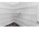 Walk-in pantry with wire shelving for storage at 8874 Players Dr, Weeki Wachee, FL 34613