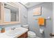 Clean bathroom with single sink vanity, toilet, and shower at 5111 Amulet Dr # 202, New Port Richey, FL 34652