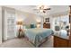 Spacious bedroom with a king-size bed and access to a private balcony at 5111 Amulet Dr # 202, New Port Richey, FL 34652