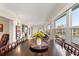 Sunlit dining area with large windows and seating for six at 5111 Amulet Dr # 202, New Port Richey, FL 34652