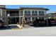 Two-story building exterior with parking at 5111 Amulet Dr # 202, New Port Richey, FL 34652