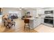 Modern kitchen features granite countertops, stainless steel appliances, and white shaker cabinets at 5111 Amulet Dr # 202, New Port Richey, FL 34652