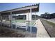 Covered shuffleboard courts with benches at 5111 Amulet Dr # 202, New Port Richey, FL 34652