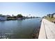 Scenic waterfront view with boats and walkway at 5111 Amulet Dr # 202, New Port Richey, FL 34652