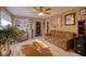 Relaxing living room with brown couch and a cowhide rug at 12607 Pecan Tree Dr, Hudson, FL 34669