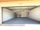 Spacious garage with ample storage shelving at 5930 Precious View Ct, New Port Richey, FL 34655
