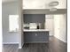 Modern kitchen with stainless steel appliances and island at 5930 Precious View Ct, New Port Richey, FL 34655