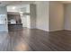 Bright living room with grey walls and wood-look floors at 5930 Precious View Ct, New Port Richey, FL 34655